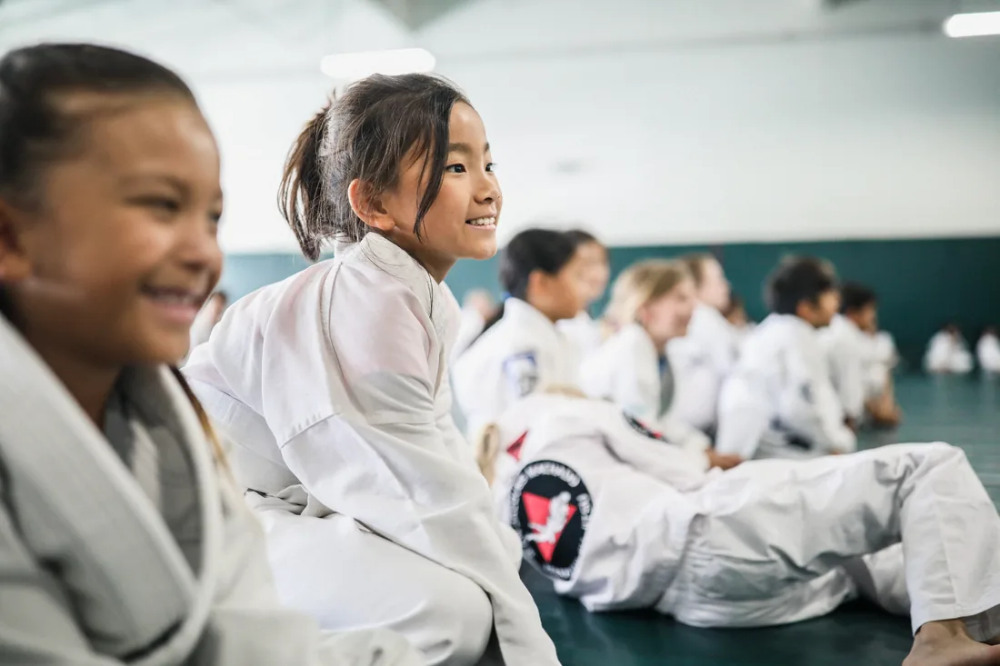 Kids celebrating during a Gracie Bullyproof class at Gracie Jiu-Jitsu Warwick