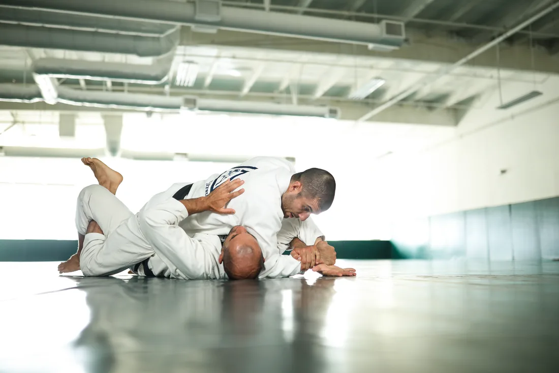 Demonstrating an americana armlock from mount