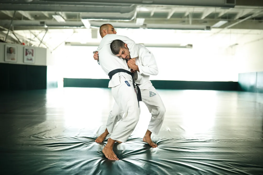 Demonstrating a guillotine defense during Master Cycle training