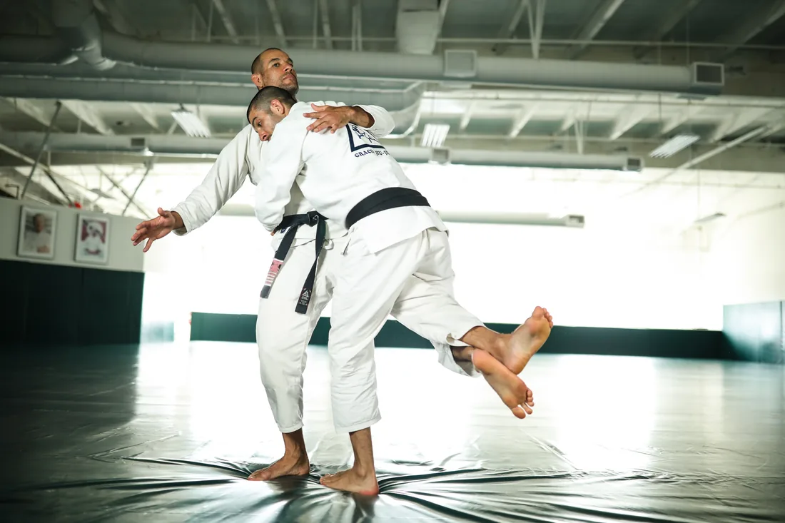 Students practicing a leg-hook takedown at Gracie Jiu-Jitsu Warwick, near West Warwick, RI