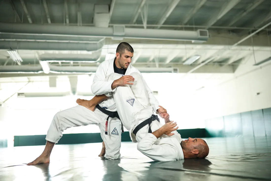 Drilling the punch block from guard during a Gracie Combatives class